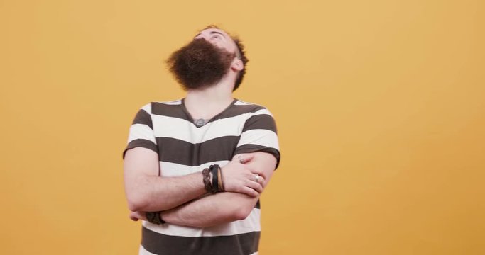 Portrait of a young disturbed man showing signs of restlessness. Man being unsafe and worried about something that gone wrong.