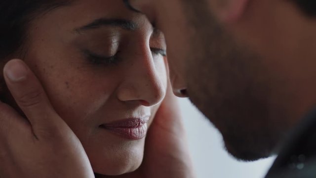 happy couple sharing intimate connection husband caressing his wifes face enjoying romantic relationship at home