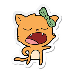 sticker of a cartoon yawning cat