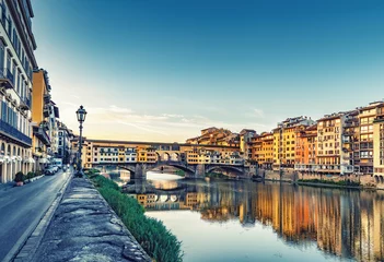 Foto op Canvas Scenic view on Ponte Vecchio in Florence, Italy, on a summer day. Colorful travel background. © Funny Studio