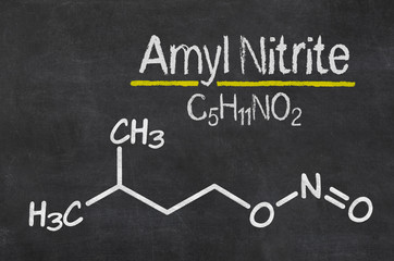 Blackboard with the chemical formula of Amly nitrite