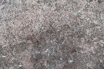 Close up texture of granite walls and rocks in high resolution with cracks and stunning structures