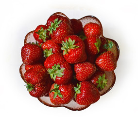 Ripe strawberries in a vase.