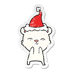 happy distressed sticker cartoon of a polar bear wearing santa hat