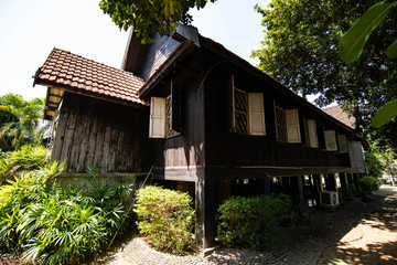 Fototapeta na wymiar Antique golden teak house over 100 years old