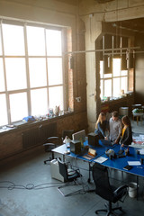 The team is working on a project in a modern office.