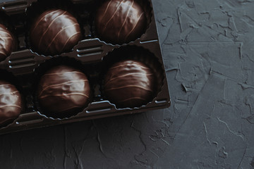 Chocolate cakes on a dark background