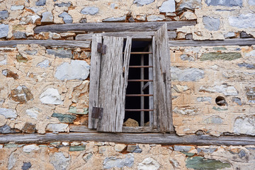 Stone house wall of old house in Olympic riviera, Greece