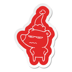 angry bear polar cartoon  sticker of a wearing santa hat