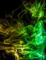 Colored smoke on black background