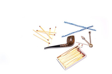 Pipe, accessory and tobacco isolated on white