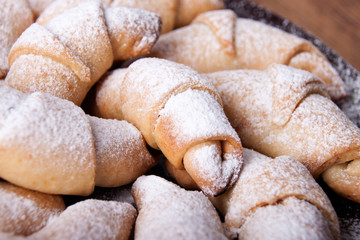 Homemade bagels with jam and powdered sugar