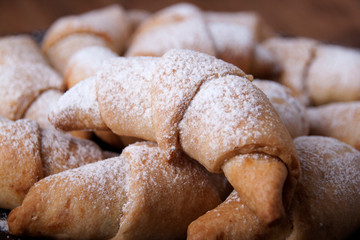 Homemade bagels with jam and powdered sugar
