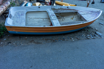Fototapeta na wymiar Italy, Cinque Terre, Monterosso, a boat sitting in the sand