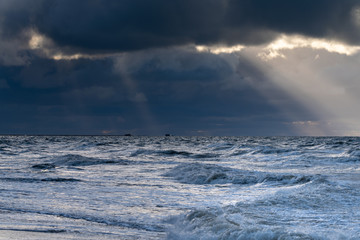 Stormy clouds above Baltic sea in winter time, Latvia coast.