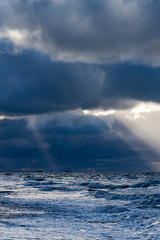 Stormy clouds above Baltic sea in winter time, Latvia coast.