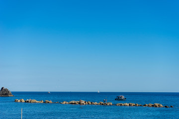 Italy, Cinque Terre, Monterosso, a large body of water next to the ocean