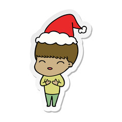 happy sticker cartoon of a boy wearing santa hat