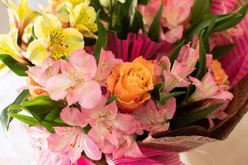 Beautiful elegant summer spring bouquet with roses and alstroemerias