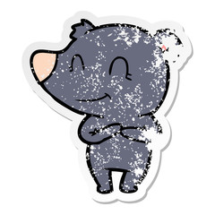 distressed sticker of a friendly bear cartoon