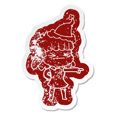 cartoon distressed sticker of a woman wearing santa hat
