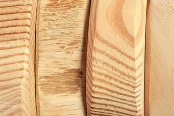 Wooden pyramid from processed wood of different textures close-up macro photo background