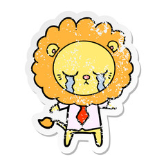distressed sticker of a crying cartoon lion
