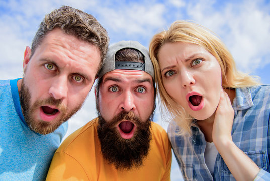 Amazed surprised face expression. How to impress people. Shocking impression. Men with beard and woman looking shocked. No way. Friends shocked faces looking at you. That is impossible. Shocking news