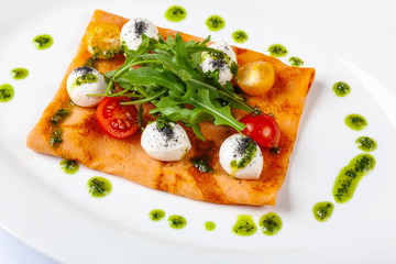 Pancake with tomato and Arugula