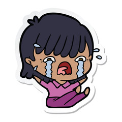sticker of a cartoon girl crying