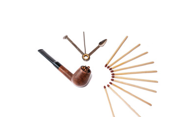 Pipe, accessory and tobacco isolated on white