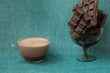 Chopped chocolate on rustic sackcloth