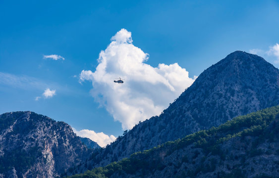 helicopter flight at the peaks of the Tauri southern coastal mountains covered with relict pines