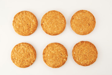 Oatmeal cookie isolated on white. Healthy round cookies.