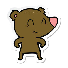sticker of a smiling bear cartoon