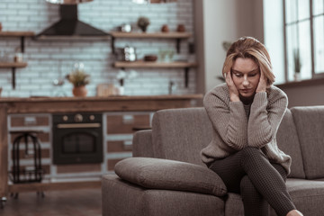 Mature woman feeling awful after divorce with husband