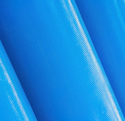 Stack of new blue pipes (tubes)