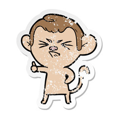 distressed sticker of a cartoon angry monkey