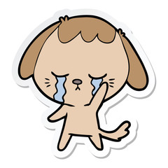 sticker of a cartoon dog crying