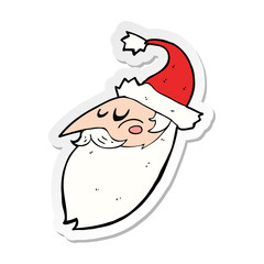 sticker of a cartoon santa face