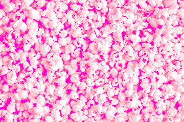 Flat lay of pop corn rose texture background.