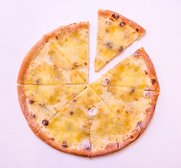 Flat lay pizza with pineapple on white background
