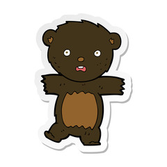 sticker of a cartoon shocked black bear cub