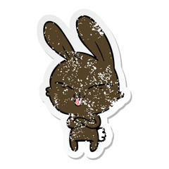 distressed sticker of a cute cartoon rabbit
