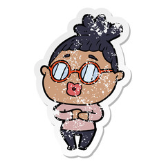 distressed sticker of a cartoon woman wearing spectacles