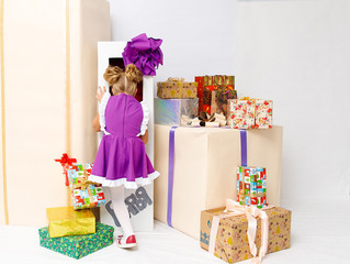 doll is hiding in a box