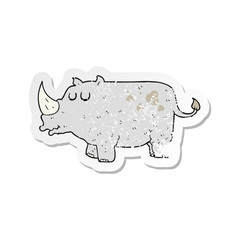 retro distressed sticker of a cartoon rhino