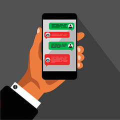 Chat concept. Hand holds smartphone with dialog boxes. Flat design of messaging bubbles. Chatting witn robot and human. Vector illustration. Isolated.