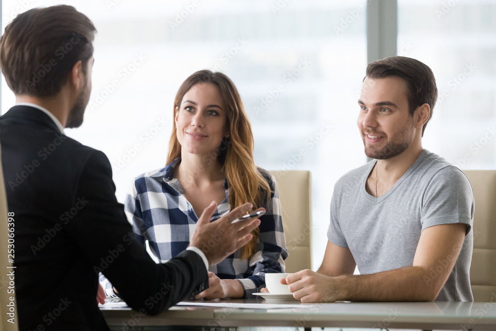 Wall mural financial advisor making presentation offer to clients at meeting