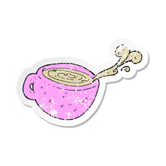 retro distressed sticker of a cartoon coffee cup